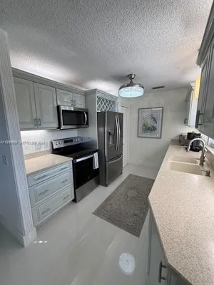 Property Slideshow image 3 of 35 | 17 lake vista trl apt 201, Port Saint Lucie, FL, 34952