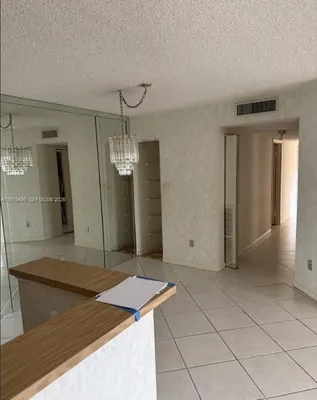 Property Slideshow image 2 of 8 | 10753 w clairmont cir 106, Tamarac, FL, 33321