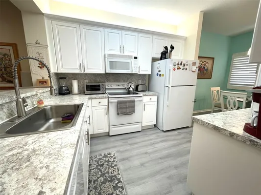 Property Slideshow image 3 of 23 | 7775 yardley dr 409, Tamarac, FL, 33321