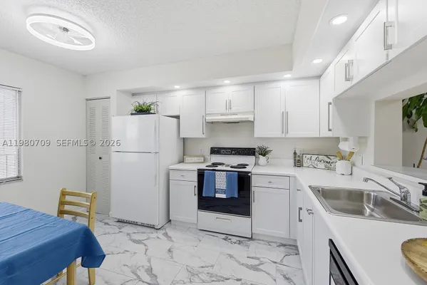 Property Slideshow image 2 of 30 | 1200 sw 137th ave 308e, Pembroke Pines, FL, 33027