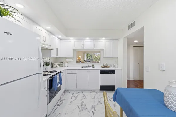 Property Slideshow image 3 of 30 | 1200 sw 137th ave 308e, Pembroke Pines, FL, 33027