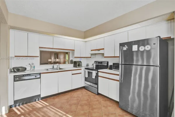 Property Slideshow image 3 of 35 | 1110 sw 125th ave 209m, Pembroke Pines, FL, 33027