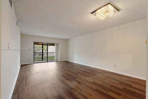 Property Slideshow image 2 of 16 | 4965 e sabal palm blvd 207, Tamarac, FL, 33319