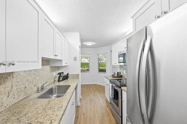 Property Slideshow image 2 of 41 | 1401 sw 128th ter 103h, Pembroke Pines, FL, 33027