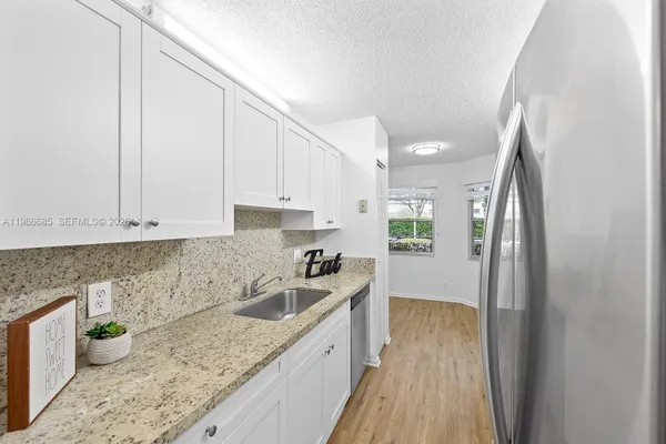 Property Slideshow image 3 of 41 | 1401 sw 128th ter 103h, Pembroke Pines, FL, 33027