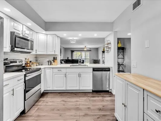 Property Slideshow image 3 of 38 | 12500 sw 5th ct 208m, Pembroke Pines, FL, 33027