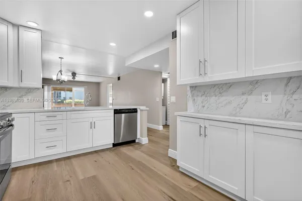 Property Slideshow image 3 of 39 | 12500 sw 5th ct 109m, Pembroke Pines, FL, 33027