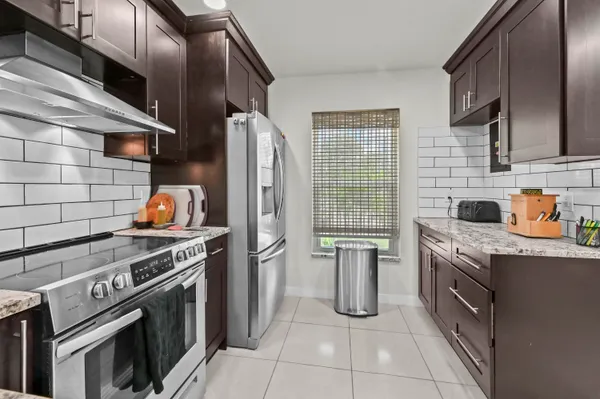 Property Slideshow image 3 of 25 | 647 marlboro oval, ,, FL, 33467