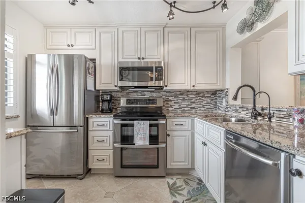Property Slideshow image 3 of 31 | 7410 lake breeze dr 509, Fort Myers, FL, 33907
