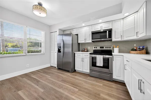 Property Slideshow image 2 of 69 | 12701 sw 14th st 108j, Pembroke Pines, FL, 33027