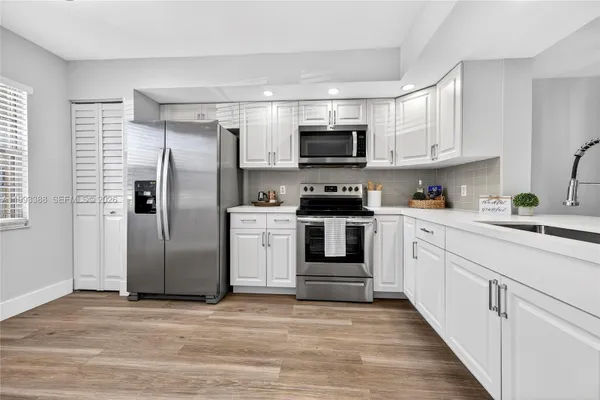 Property Slideshow image 3 of 62 | 12701 sw 14th st 108j, Pembroke Pines, FL, 33027