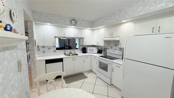 Property Slideshow image 2 of 25 | 12651 sw 16th ct 202b, Pembroke Pines, FL, 33027