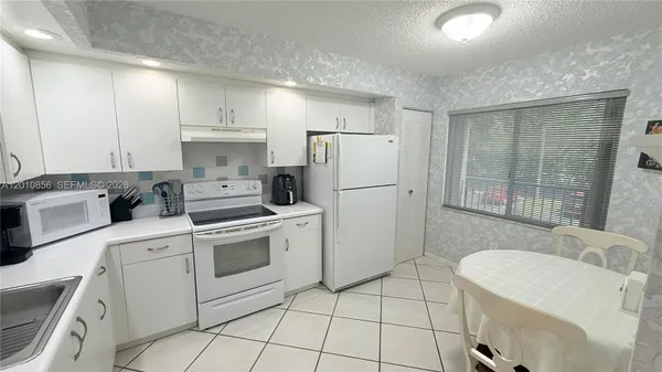 Property Slideshow image 3 of 25 | 12651 sw 16th ct 202b, Pembroke Pines, FL, 33027