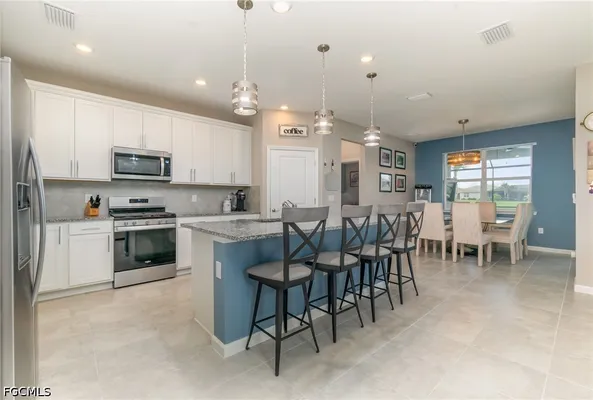 Property Slideshow image 3 of 37 | 7079 chapel creek ln, North Fort Myers, FL, 33917