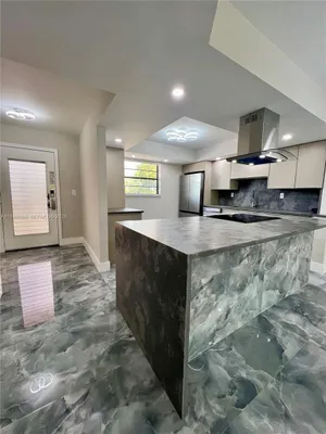 Property Slideshow image 2 of 58 | 4930 e sabal palm blvd 206, Tamarac, FL, 33319