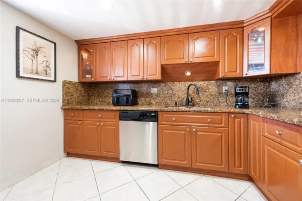 Property Slideshow image 2 of 25 | 4975 e sabal palm blvd 309, Tamarac, FL, 33319
