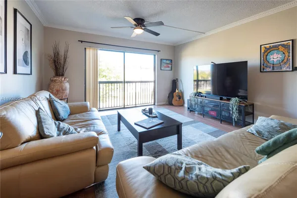 Property Slideshow image 3 of 25 | 4975 e sabal palm blvd 309, Tamarac, FL, 33319