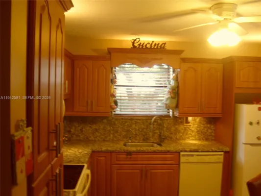 Property Slideshow image 3 of 42 | 4950 e sabal palm blvd 310, Tamarac, FL, 33319