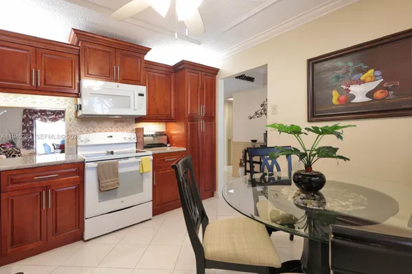 Property Slideshow image 3 of 20 | 4940 e sabal palm blvd apt 203, Tamarac, FL, 33319