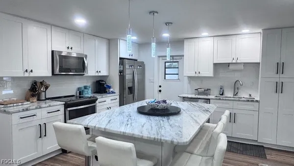 Property Slideshow image 2 of 42 | 5524 ben franklin ln, North Fort Myers, FL, 33917