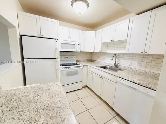 Property Slideshow image 2 of 31 | 3061 nw 47th ter 228b, Lauderdale Lakes, FL, 33313