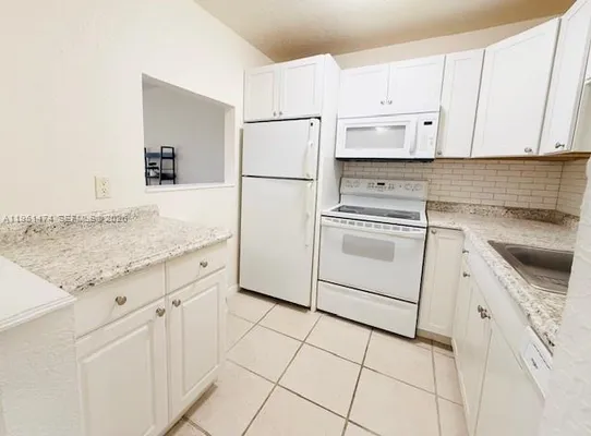 Property Slideshow image 3 of 31 | 3061 nw 47th ter 228b, Lauderdale Lakes, FL, 33313