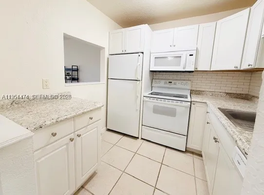 Property Slideshow image 3 of 31 | 3061 nw 47th ter 228b, Lauderdale Lakes, FL, 33313