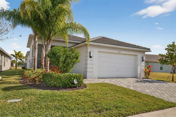 Property Slideshow image 2 of 63 | 13515 sw river rock rd, Port St Lucie, FL, 34987