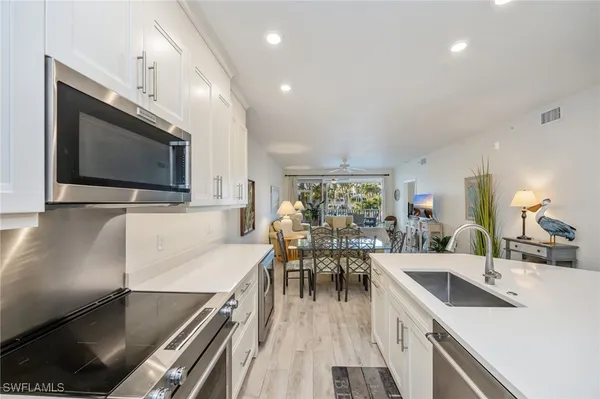 Property Slideshow image 3 of 32 | 7686 pebble creek cir 102, Naples, FL, 34108