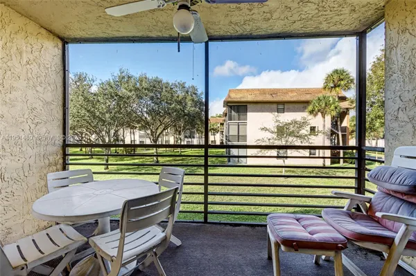 Property Slideshow image 2 of 23 | 6085 n sabal palm blvd 208, Tamarac, FL, 33319