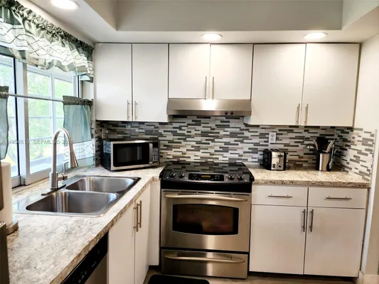 Property Slideshow image 3 of 28 | 9101 lime bay blvd 305, Tamarac, FL, 33321