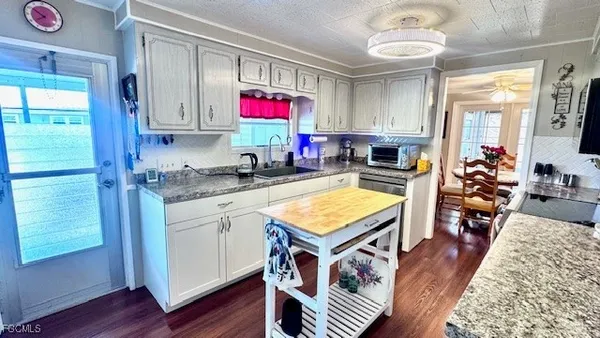 Property Slideshow image 3 of 49 | 14667 paul revere loop, North Fort Myers, FL, 33917