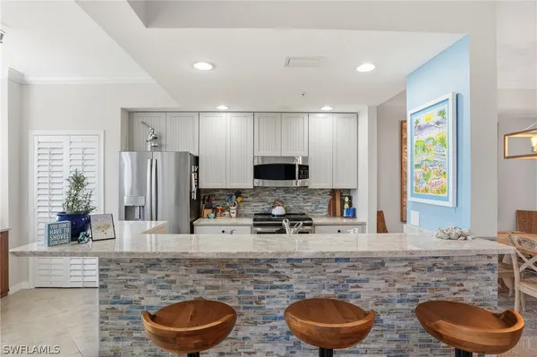 Property Slideshow image 2 of 30 | 9715 acqua ct 113, Naples, FL, 34113