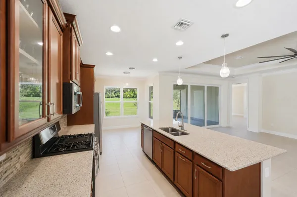 Property Slideshow image 3 of 58 | 11917 sw seahorse springs ter, Port St Lucie, FL, 34987