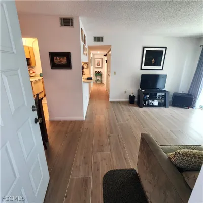 Property Slideshow image 2 of 31 | 9570 green cypress ln 15-g2, Fort Myers, FL, 33905