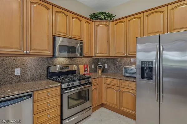 Property Slideshow image 3 of 50 | 8987 cherry oaks trl 202, Naples, FL, 34114