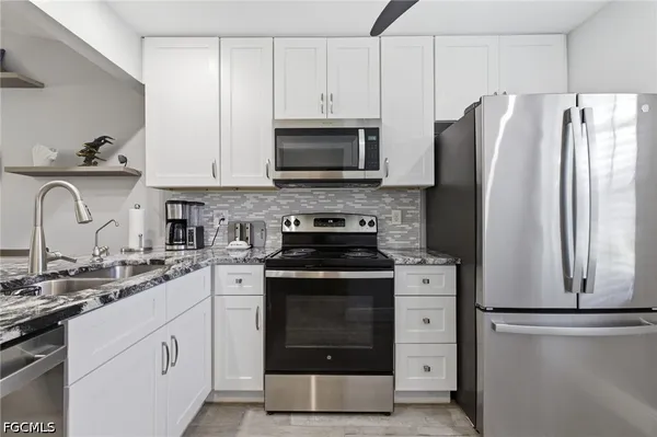 Property Slideshow image 2 of 45 | 16521 bayleaf ln 66, Fort Myers, FL, 33908