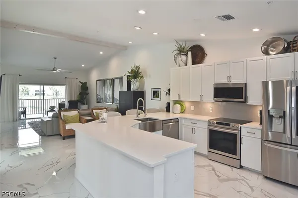 Property Slideshow image 2 of 50 | 10235 bismark palm way 1521, Fort Myers, FL, 33966