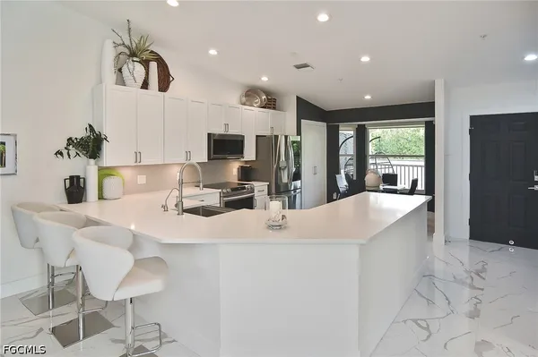 Property Slideshow image 3 of 50 | 10235 bismark palm way 1521, Fort Myers, FL, 33966