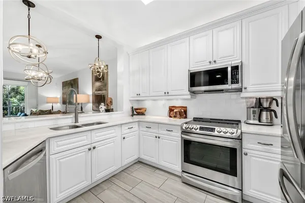 Property Slideshow image 2 of 46 | 7671 pebble creek cir 105, Naples, FL, 34108