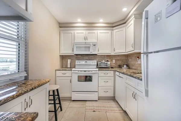 Property Slideshow image 2 of 29 | 1700 pine valley dr 207, Fort Myers, FL, 33907