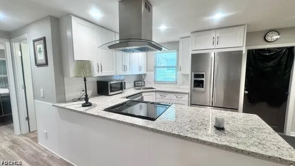 Property Slideshow image 3 of 49 | 5509 miles standish ln, North Fort Myers, FL, 33917