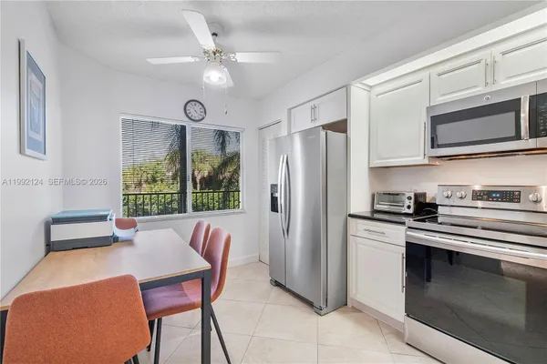 Property Slideshow image 2 of 13 | 1301 sw 142nd ave 203h, Pembroke Pines, FL, 33027