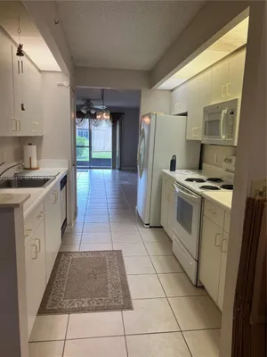 Property Slideshow image 2 of 5 | 12550 sw 15 st 106e, Pembroke Pines, FL, 33027