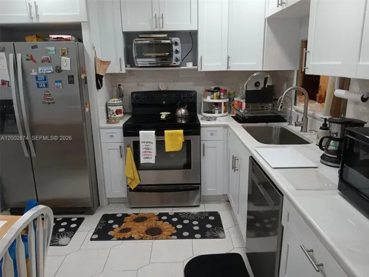 Property Slideshow image 2 of 7 | 6301 n university dr 202, Tamarac, FL, 33321