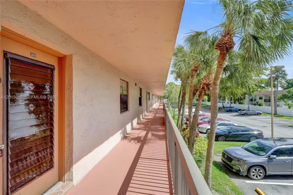 Property Slideshow image 2 of 28 | 4960 e sabal palm blvd 203, Tamarac, FL, 33319