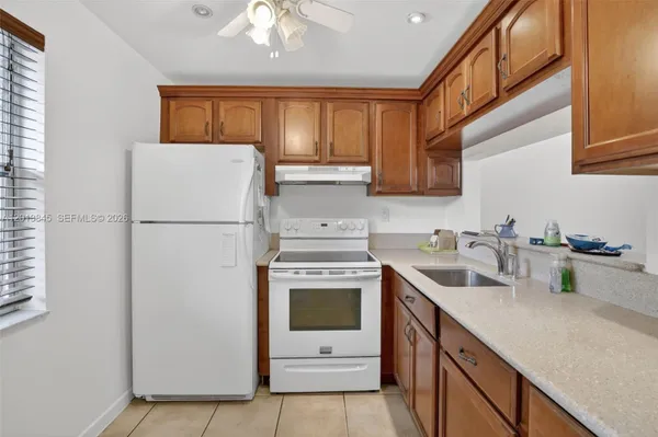 Property Slideshow image 3 of 44 | 9090 lime bay blvd 203, Tamarac, FL, 33321