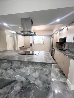 Property Slideshow image 3 of 65 | 4930 e sabal palm blvd 206, Tamarac, FL, 33319