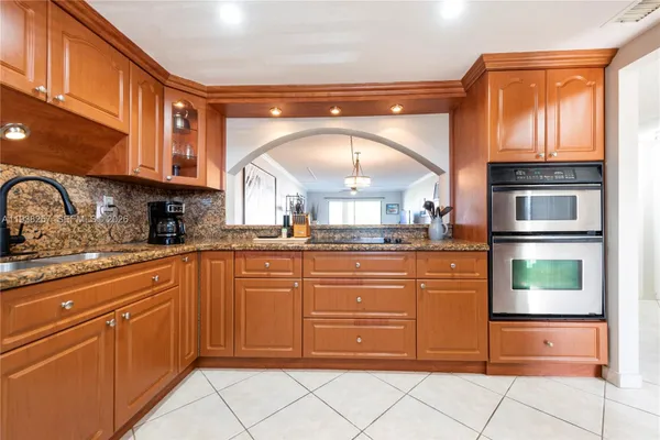 Property Slideshow image 3 of 25 | 4975 e sabal palm blvd 309, Tamarac, FL, 33319