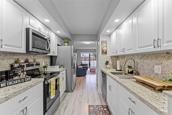 Property Slideshow image 2 of 36 | 13355 sw 16th ct 211e, Pembroke Pines, FL, 33027